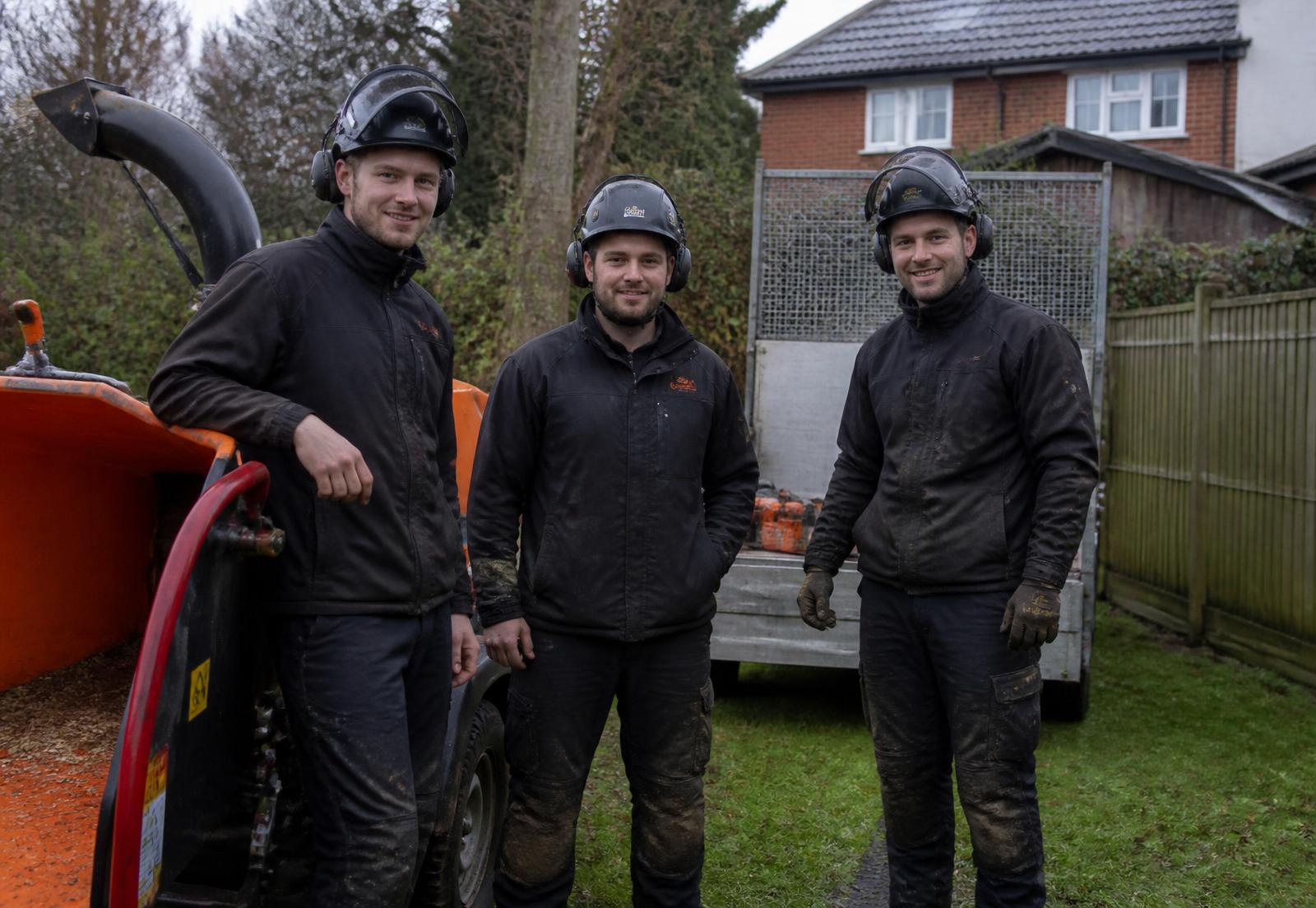 The Greenline crew alongside their chipper and equipment before starting work